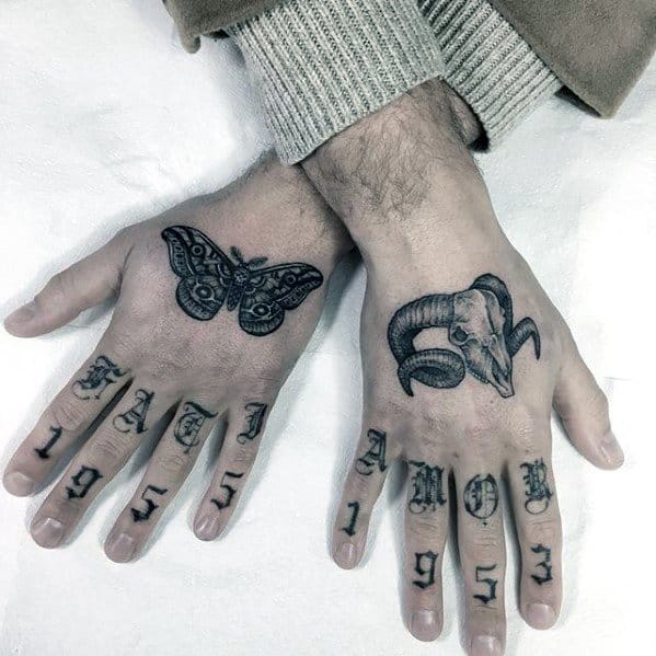 Male Simple Hand Animal Skull With Butterfly Tattoo Ideas