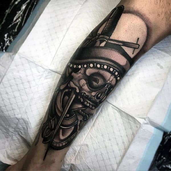 Male Skull Swords Shin Tattoo