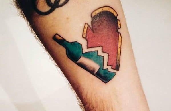Male Small Tattoo With Broken Heart Wine Design On Inner Forearm