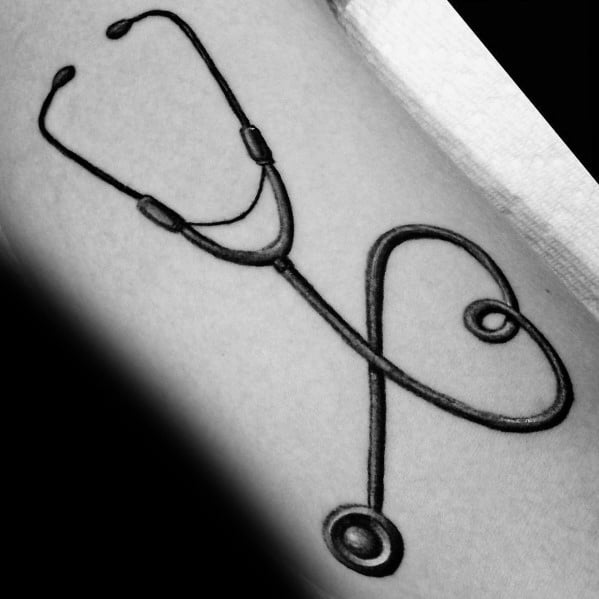 Stethoscope tattoo forming a heart shape, symbolizing love for the medical profession and dedication to patient care.