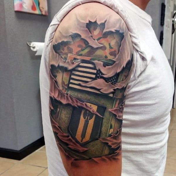 Male Tatto Of Army Badge Patch On Upper Arm Ripped Skin Design