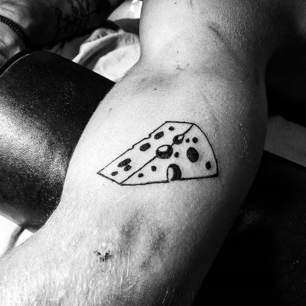 Minimalist black ink tattoo of a wedge of Swiss cheese on the arm, featuring fine linework and simple dot shading for a clean and subtle design.