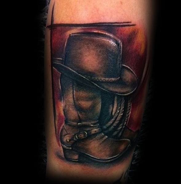 Realistic tattoo of a cowboy hat resting on a worn boot with a coiled rope, set against a warm-toned background, done in detailed Western style.