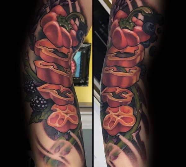 Realistic sliced bell pepper tattoo sleeve with bold shading, vibrant colors, and intricate details, creating a dynamic and eye-catching design.