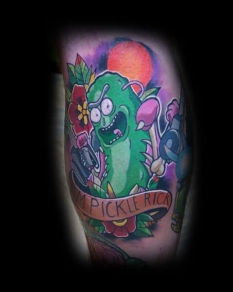 Vibrant Pickle Rick tattoo with a floral and neon-lit background, featuring a fierce expression, weapons, and a bold 'I'm Pickle Rick' banner.