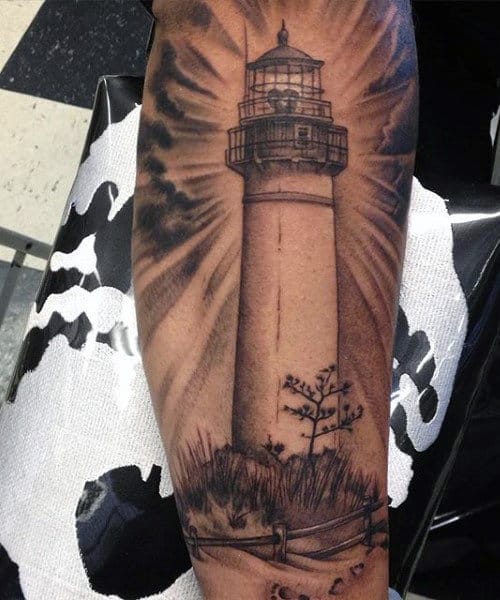 Male Tattoo Of Lighthouse