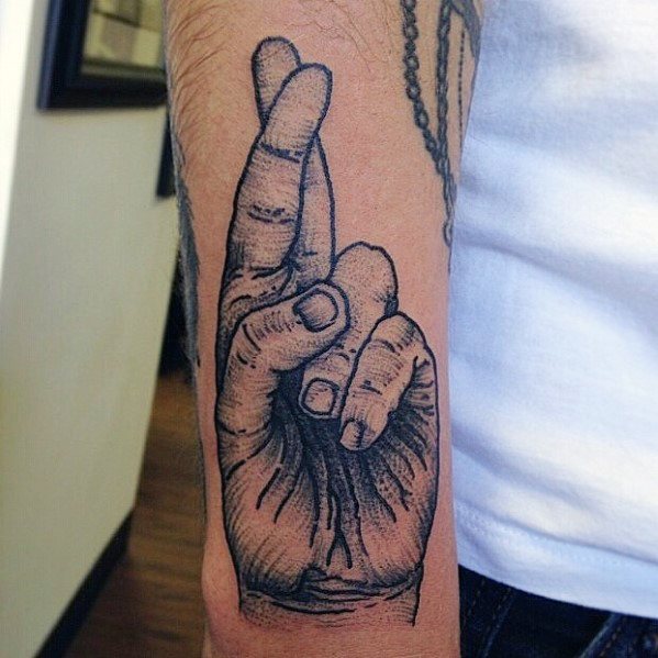Male Tattoo With Fingers Crossed Design Outer Forearm