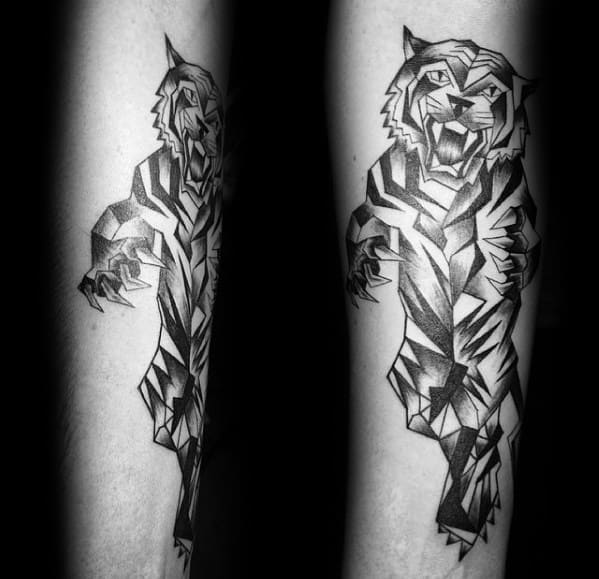 Geometric-style roaring tiger tattoo in motion on the forearm, made of sharp angular shapes and bold black shading for a fierce effect.