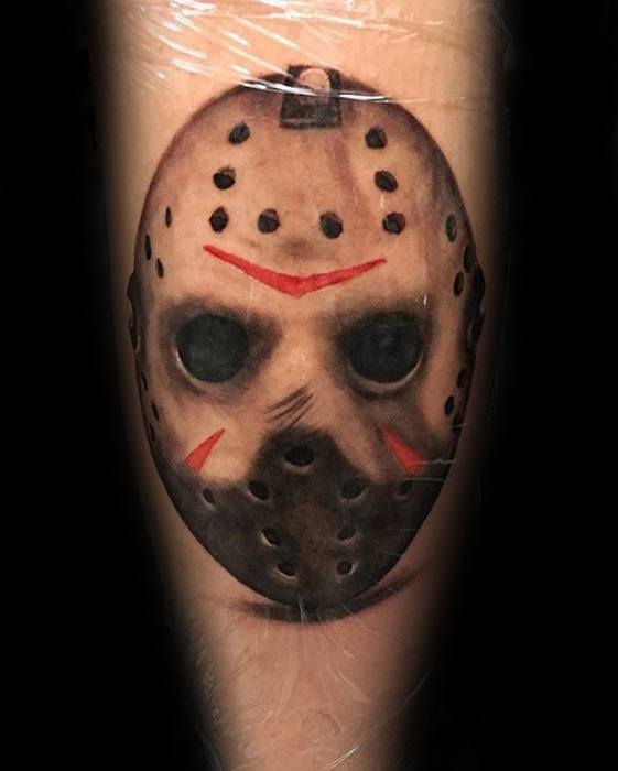 Male Tattoo With Jason Mask Design On Inner Forearm