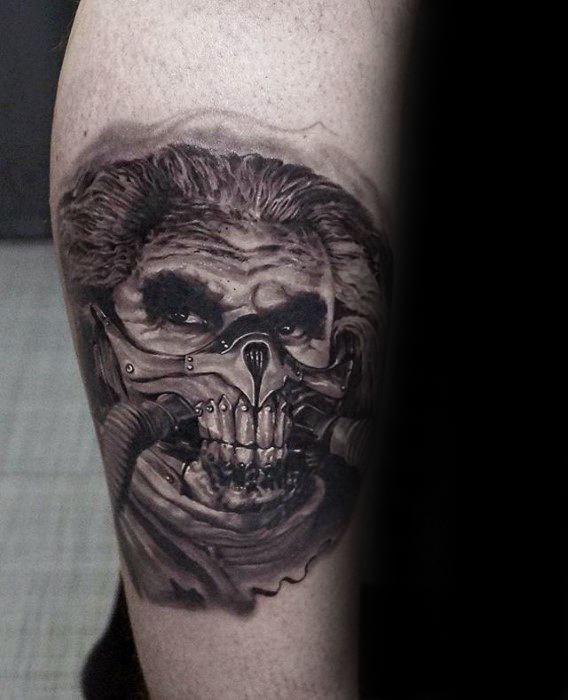 Male Tattoo With Mad Max Design On Inner Forearm