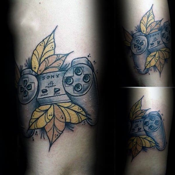 Male Tattoo With Playstation Design On Arm