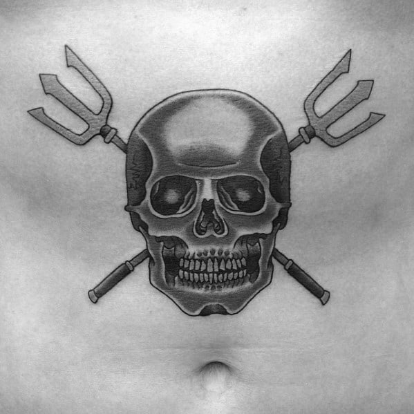 Male Tattoo With Skull And Trident Design On Chest