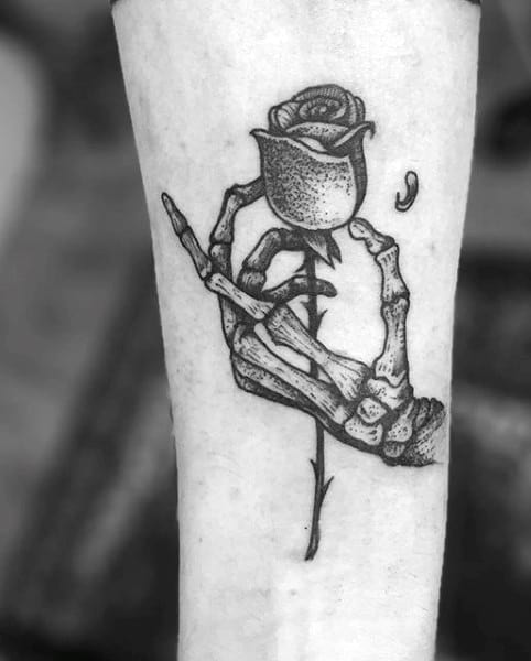 Male Tattoos Of Skeletons With Rose On Wrist