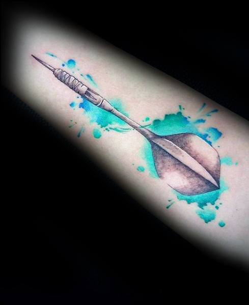 Realistic dart tattoo with a splash of teal and blue watercolor behind it, blending accuracy with artistic flair.