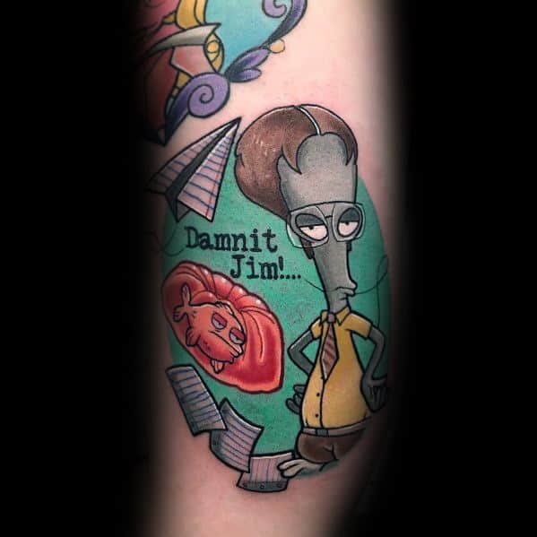 Color tattoo of Roger from *American Dad!* dressed as Dwight Schrute from *The Office*, with a stapler in Jell-O and the phrase "Dammit Jim!..."