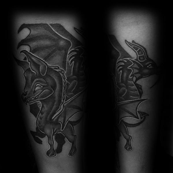 Neo-traditional Thestral tattoo with bold outlines, stylized features, and dramatic black shading on the forearm.