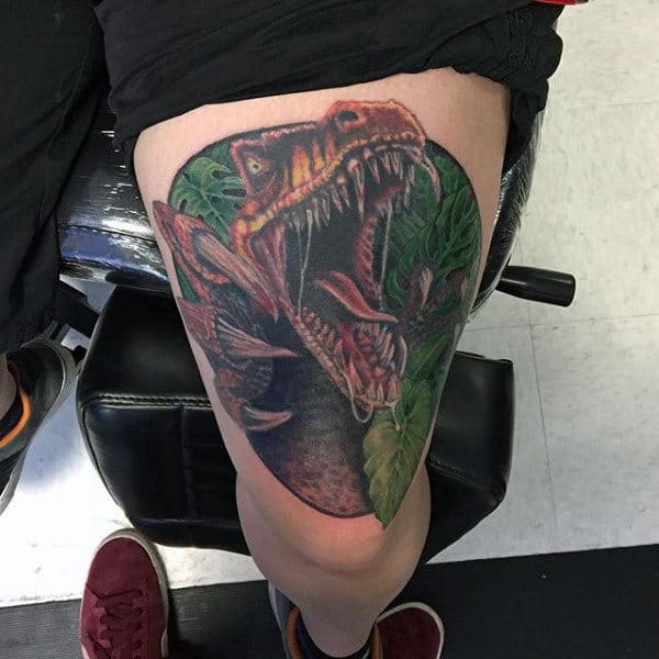 Male Thighs Hungry Dinosaur In Forest Tattoo