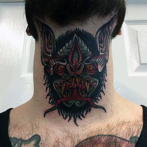 Throat tattoo featuring a fierce demonic bat with sharp fangs, intense red and black shading, and bold details for a striking look