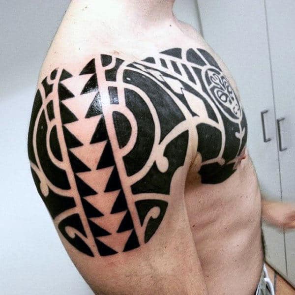 Male Tribal Arm And Chest Tattoo Ideas