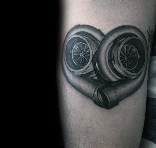 Realistic twin turbocharger tattoo forming a heart shape with fine shading, symbolizing a passion for speed, mechanics, and automotive culture.