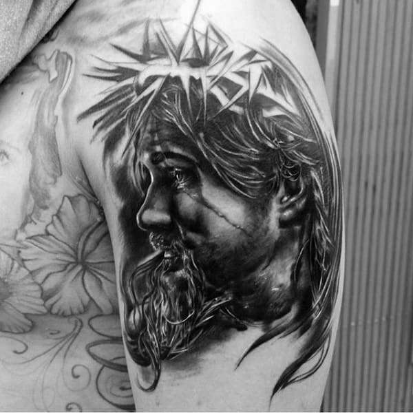 Male Upper Arm Jesus Christ Face Tattoos