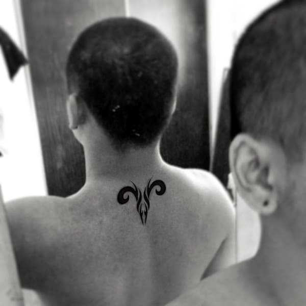 Male Upper Back Aries Astrological Sign Black Ink Tattoo