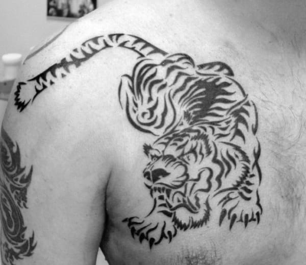 Male Upper Chest Roaring Tribal Tiger Tattoos