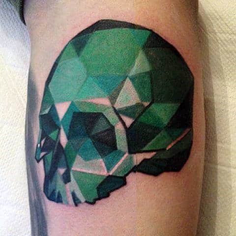 Male With 3d Green Crystal Skull Tattoo On Arm