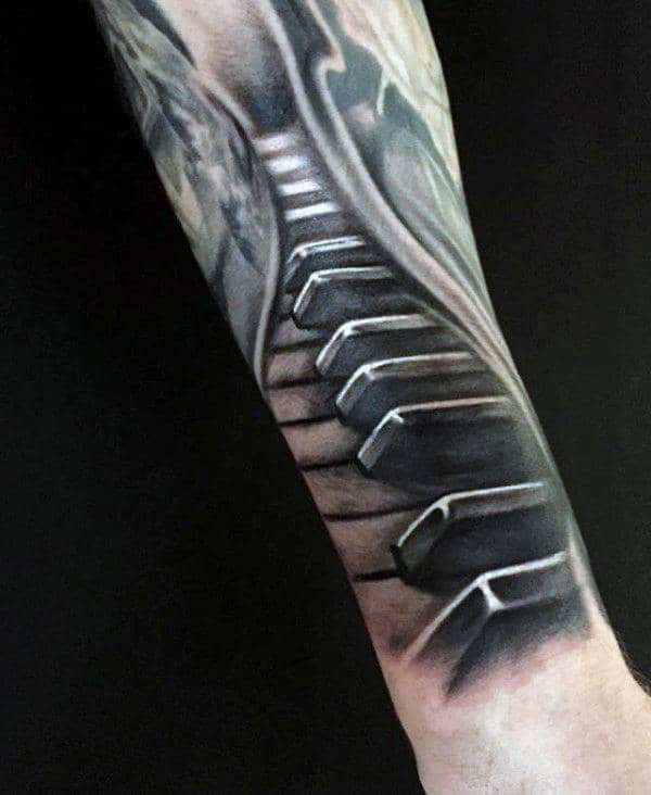 Male With 3d Piano Key Tattoo Design On Outer Forearms