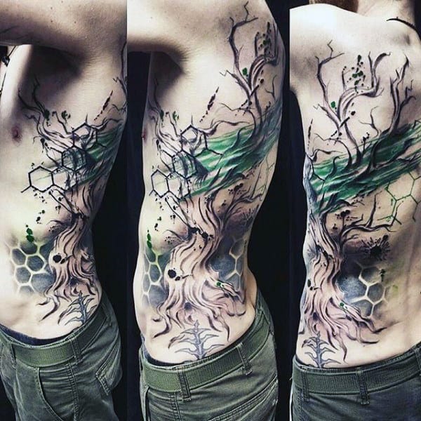 Male With Amazing Tree Tattoos On Ribcage With Watercolor Design