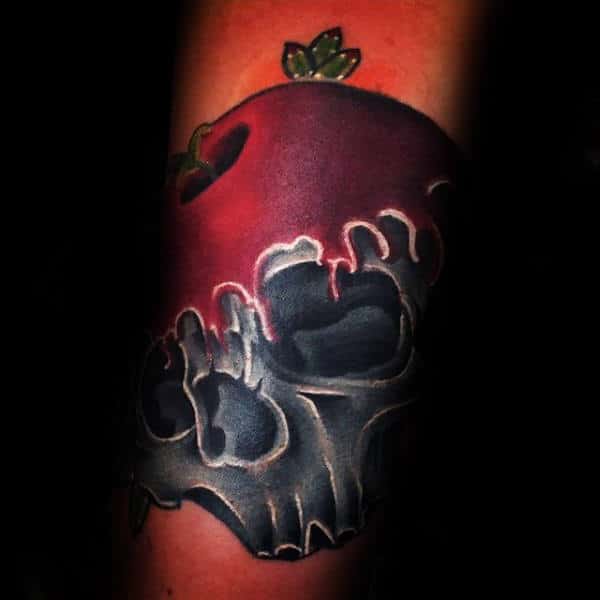 Male With Apple Over Skull Forearm Tattoo
