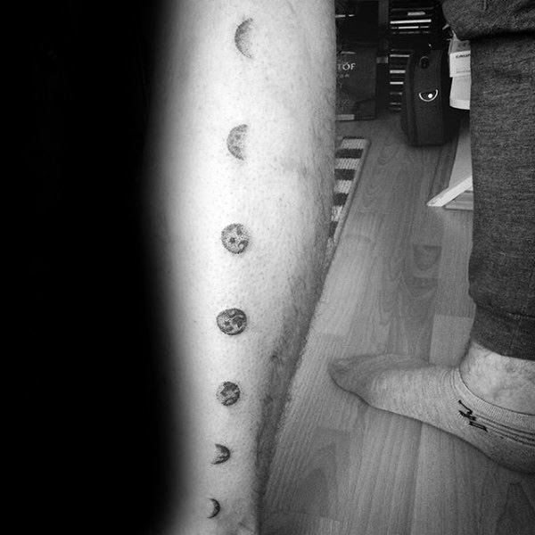 Male With Back Of Leg Tattoo Design Of Moon Phases
