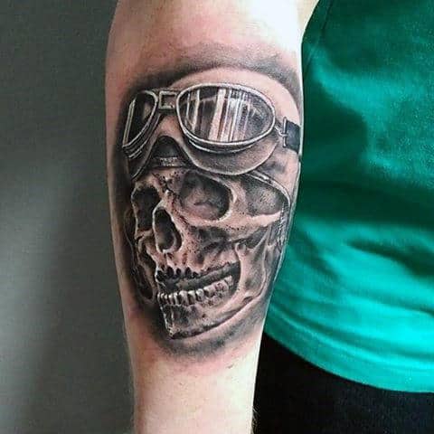 Male With Black And White Skull And Spectacles Tattoo Forearms