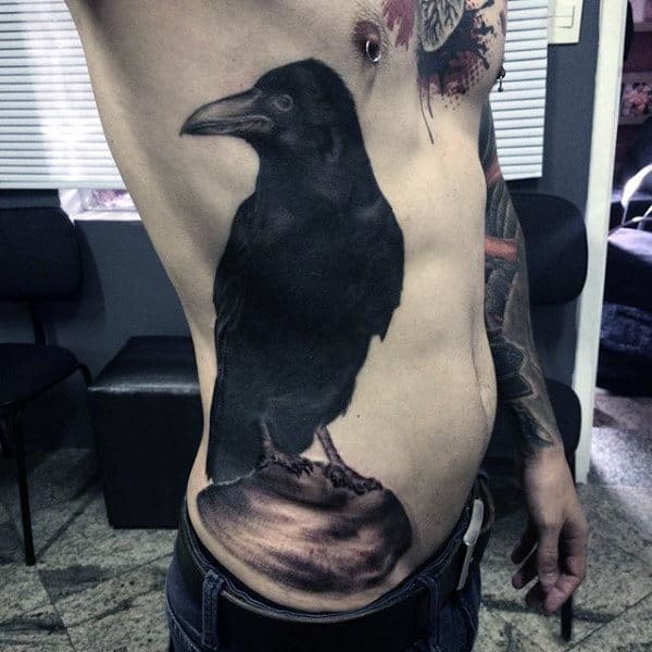 Male With Black Ink Rib Cage Side Crow Tattoo Design