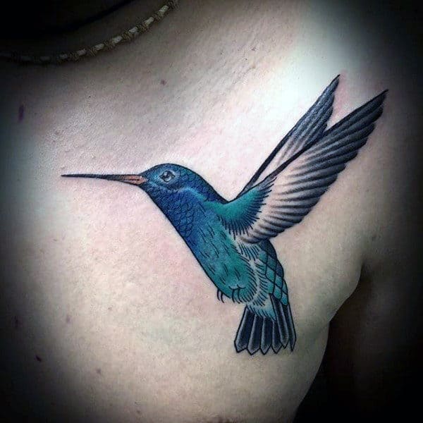 Male With Blue Hummingbird Tattoo On Upper Chest