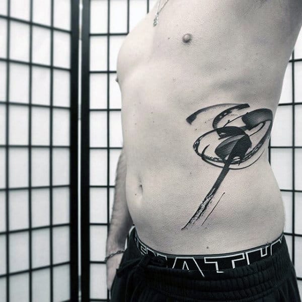 Male With Brush Stroke Ribs Tattoo Design