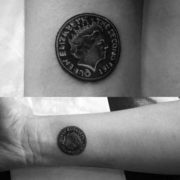 Realistic tattoo of a 1971 Queen Elizabeth II coin on the wrist, featuring intricate shading for a detailed and three-dimensional effect.