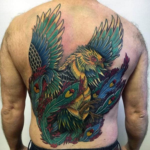 Male With Colorful Tattoo Of Phoenix Bird On Back