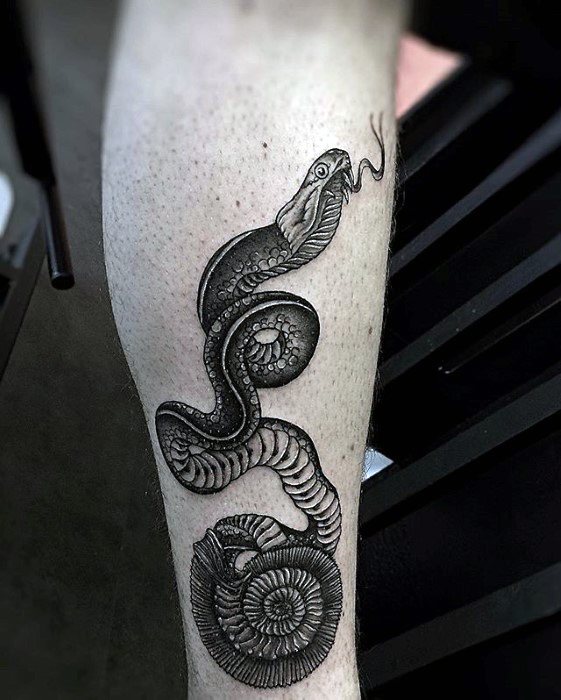 Male With Cool Ammonite Snake Leg Tattoo Design