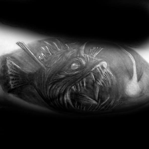 Male With Cool Angler Fish Tattoo Design Black And Grey Ink