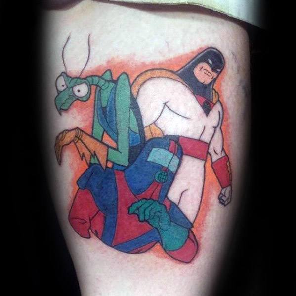 Colorful tattoo of Space Ghost and Zorak back-to-back, with bold outlines and an orange background highlighting their iconic rivalry.