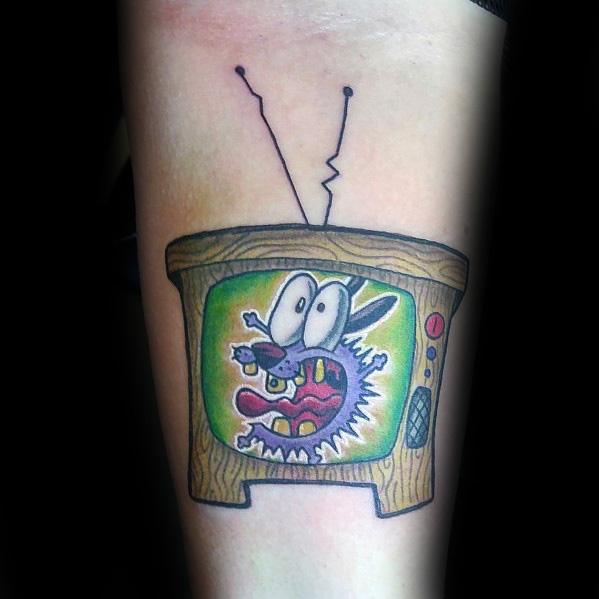 Courage the Cowardly Dog tattoo showing him screaming inside an old-fashioned TV screen with wood grain detail and antennae.