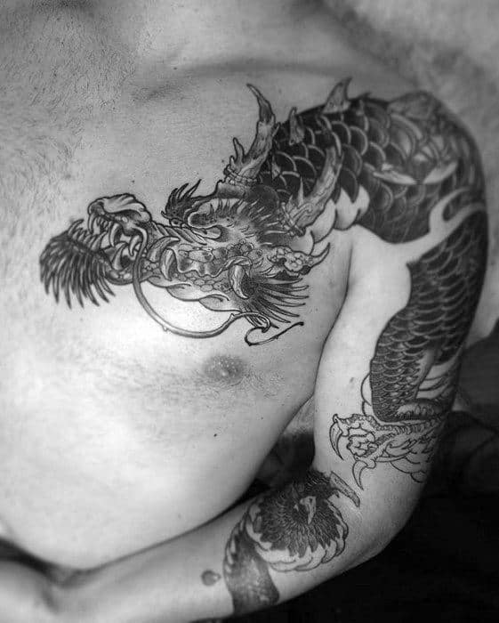 Male With Cool Dragon Shoulder Tattoo Design