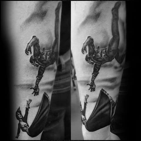 Realistic tattoo of two figures reaching for each other as one falls, symbolizing separation or rescue, inked on the forearm.