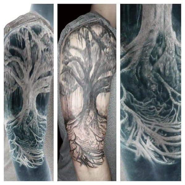 Inverted tattoo of a large, intricate tree with sprawling roots and textured bark, creating a ghostly, high-contrast effect.