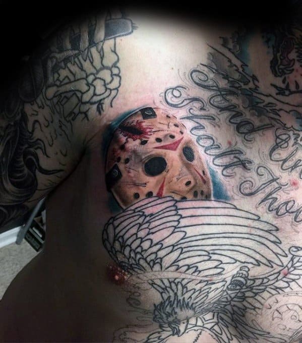 Male With Cool Jason Mask Tattoo Design Upper Chest