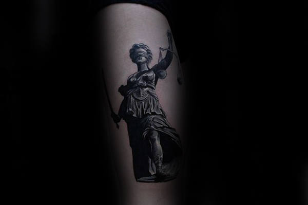 Male With Cool Lady Justice Tattoo Design On Outer Forearm
