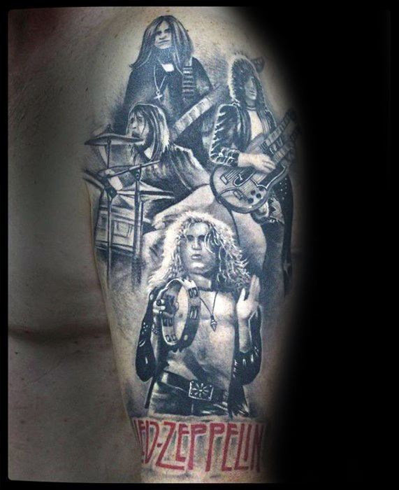 Detailed upper arm tattoo of all four Led Zeppelin members performing, with the band’s red logo at the bottom.