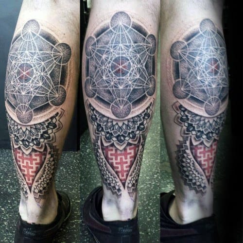 Calf tattoo featuring Metatron’s Cube with white linework, layered dotwork, mandala elements, and red geometric maze patterns below.