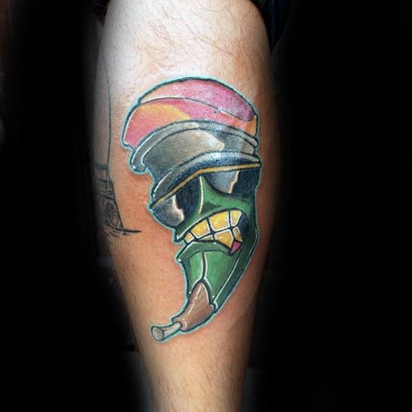 A vibrant tattoo of a chili pepper wearing a helmet, resembling a finely crafted illustration